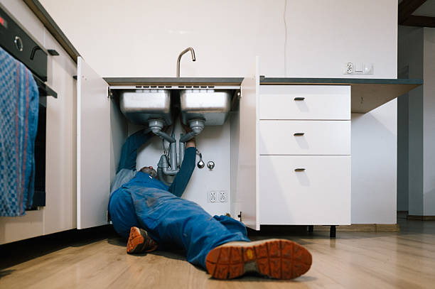 Professional Emergency Plumber technician working in Rainier, WA